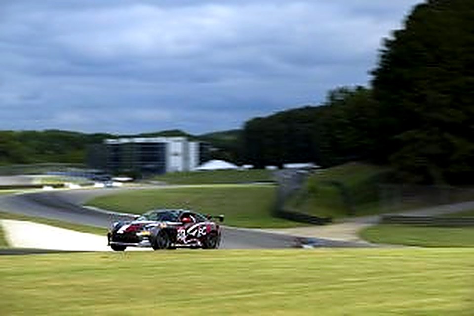 The #90 on the hillside road course at Barber