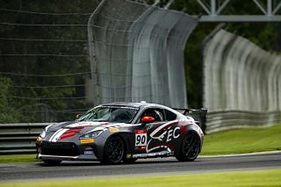 The #90 pushing hard in damp conditions at Barber