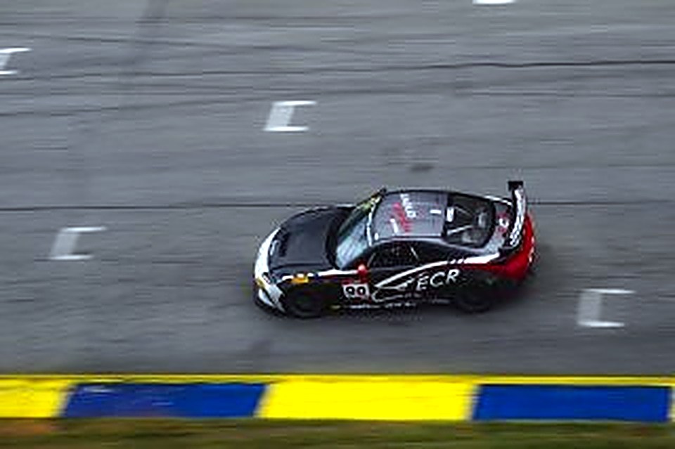 Overhead view of the #90 over yellow and blue curbing at Road Atlanta