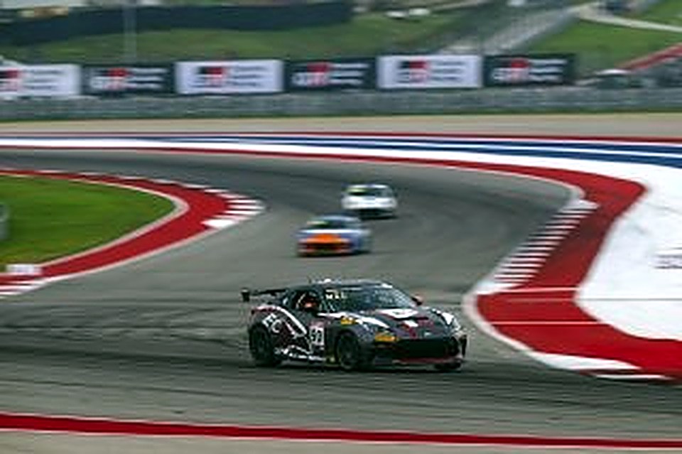 The #90 leading a pack through a corner at Circuit of The Americas