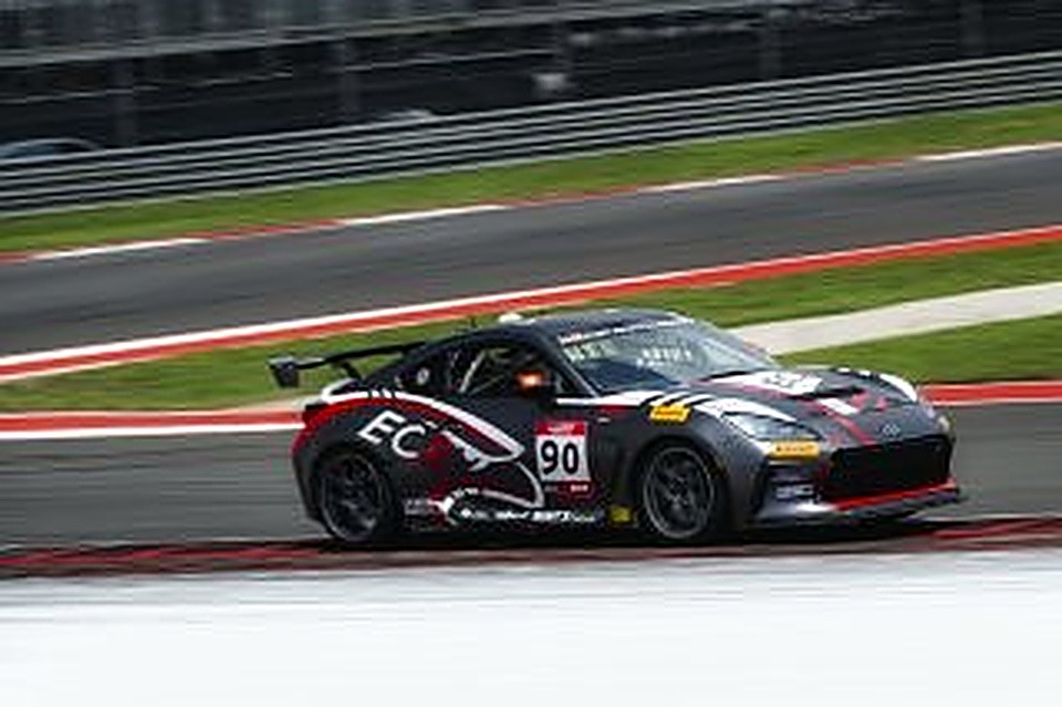 Close side view of the #90 at Circuit of The Americas