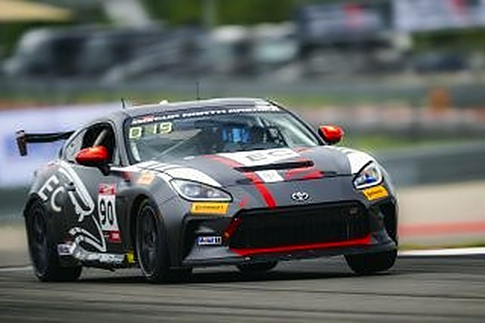 Front three-quarter view of the #90 at Circuit of The Americas